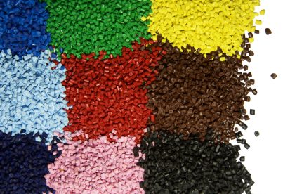 Colored plastic polymer granules isolated on white